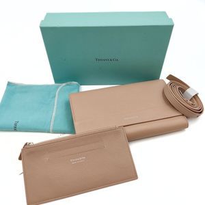 TIFFANY & CO. Tiffany & Co. Tiffany & Co. wallet with shoulder strap in beige le